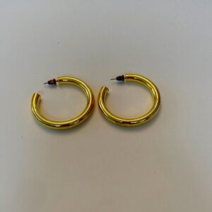 Brand new large gold earrings. Very light weight.